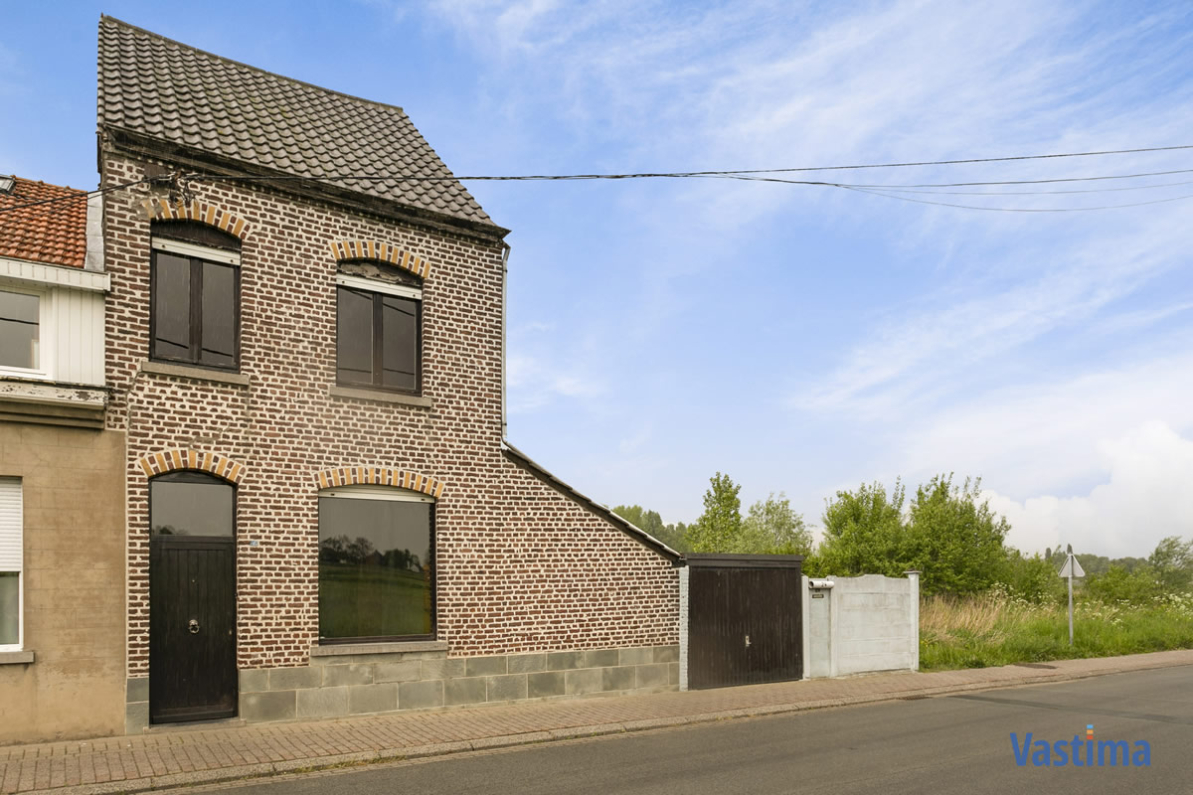 Huis Te koop Opwijk - Op te frissen woning met 3 slaapkamers en open zicht