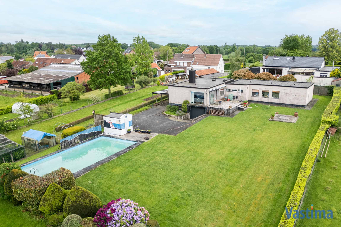 Immo Vastima - Huis Te koop Asse - Modernistische Villa met zwembad in een oase van groen
