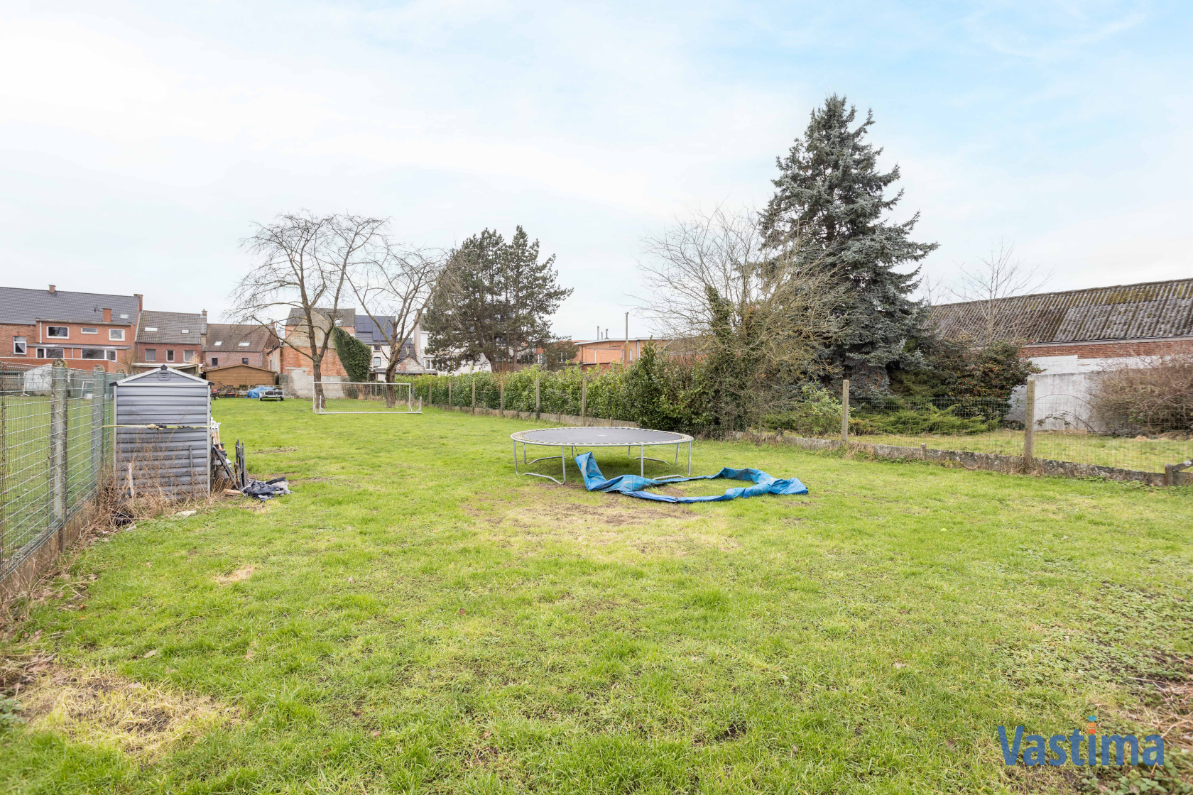 Immo Vastima - Grond Te koop Denderwindeke - Zuidwest georiënteerde bouwgrond in éénrichtingsstraat