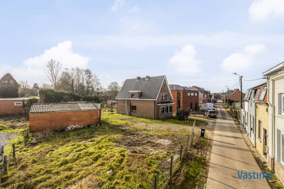 Immo Vastima - Grond Te koop Lede - Bouwgrond in verkeersluwe straat nabij dorpskern Lede