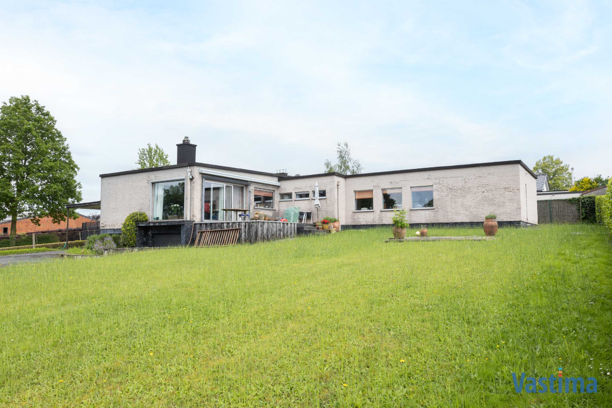 Immo Vastima - Huis Te koop Asse - Modernistische Villa met zwembad in een oase van groen