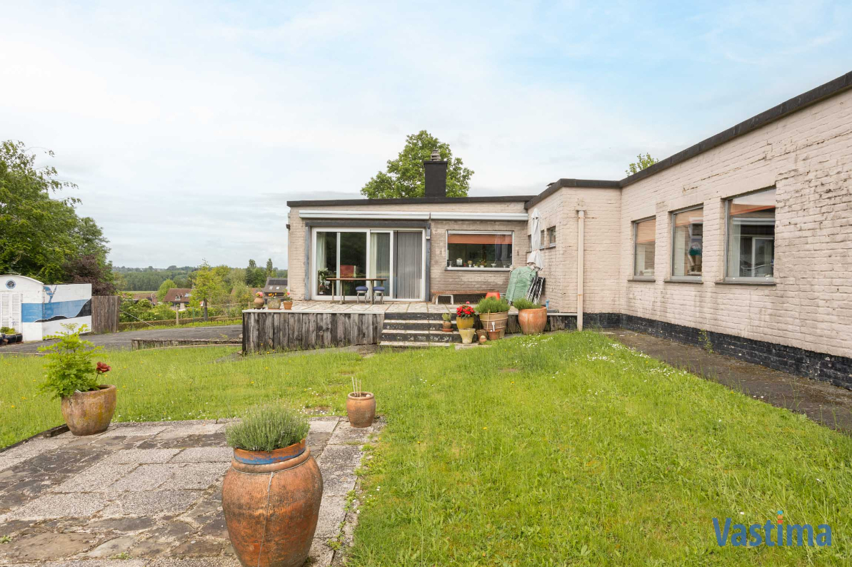 Immo Vastima - Huis Te koop Asse - Modernistische Villa met zwembad in een oase van groen