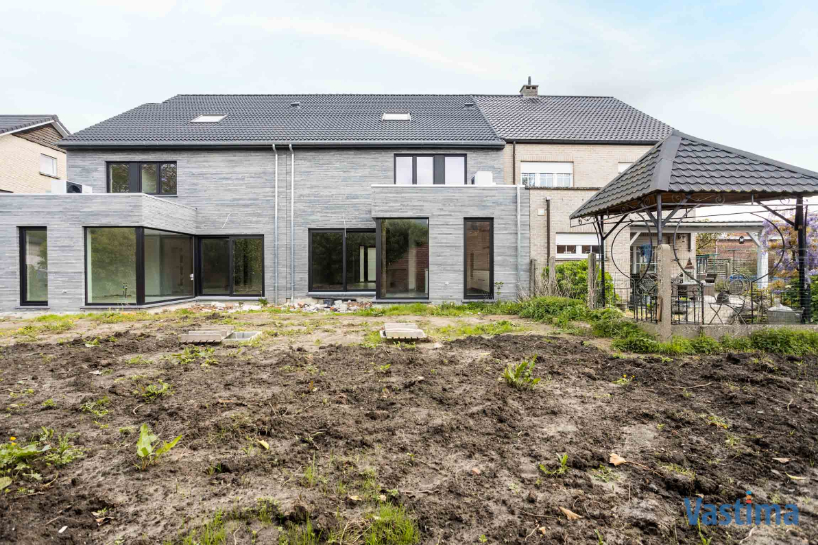 Immo Vastima - Huis Te koop Denderleeuw - Nieuwbouw gesloten woning met 3 slaapkamers, garage en tuin