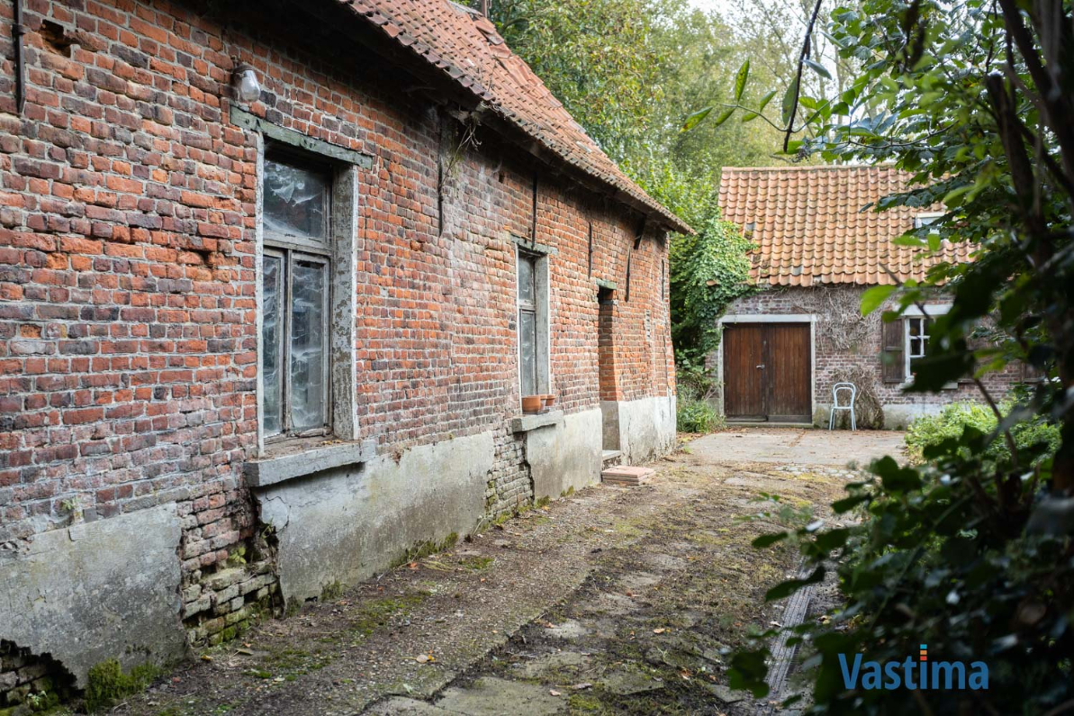 Immo Vastima - Huis Te koop Opwijk - Charmant hoevetje met schuur in een groene oase