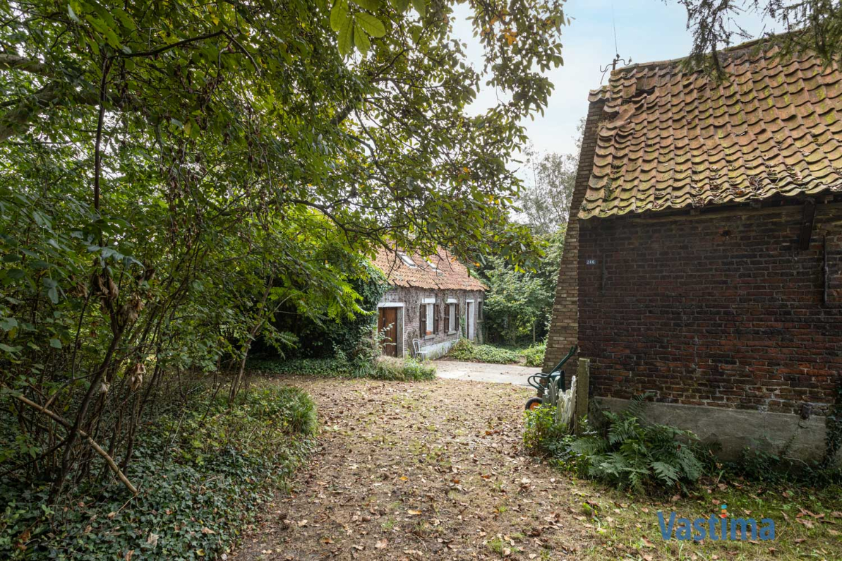 Immo Vastima - Huis Te koop Opwijk - Charmant hoevetje met schuur in een groene oase