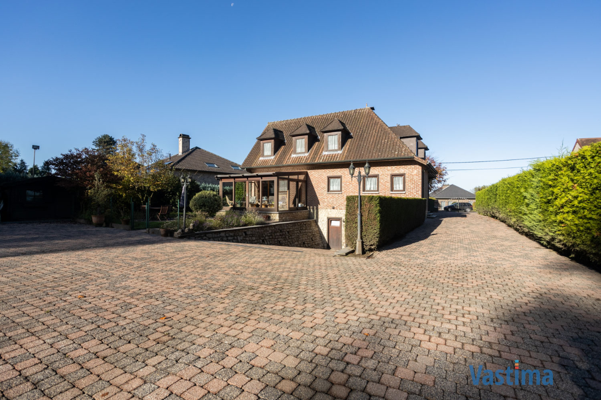 Immo Vastima - Huis Te koop Halle - Statige villa met enorm potentieel in een prachtige groene omgeving