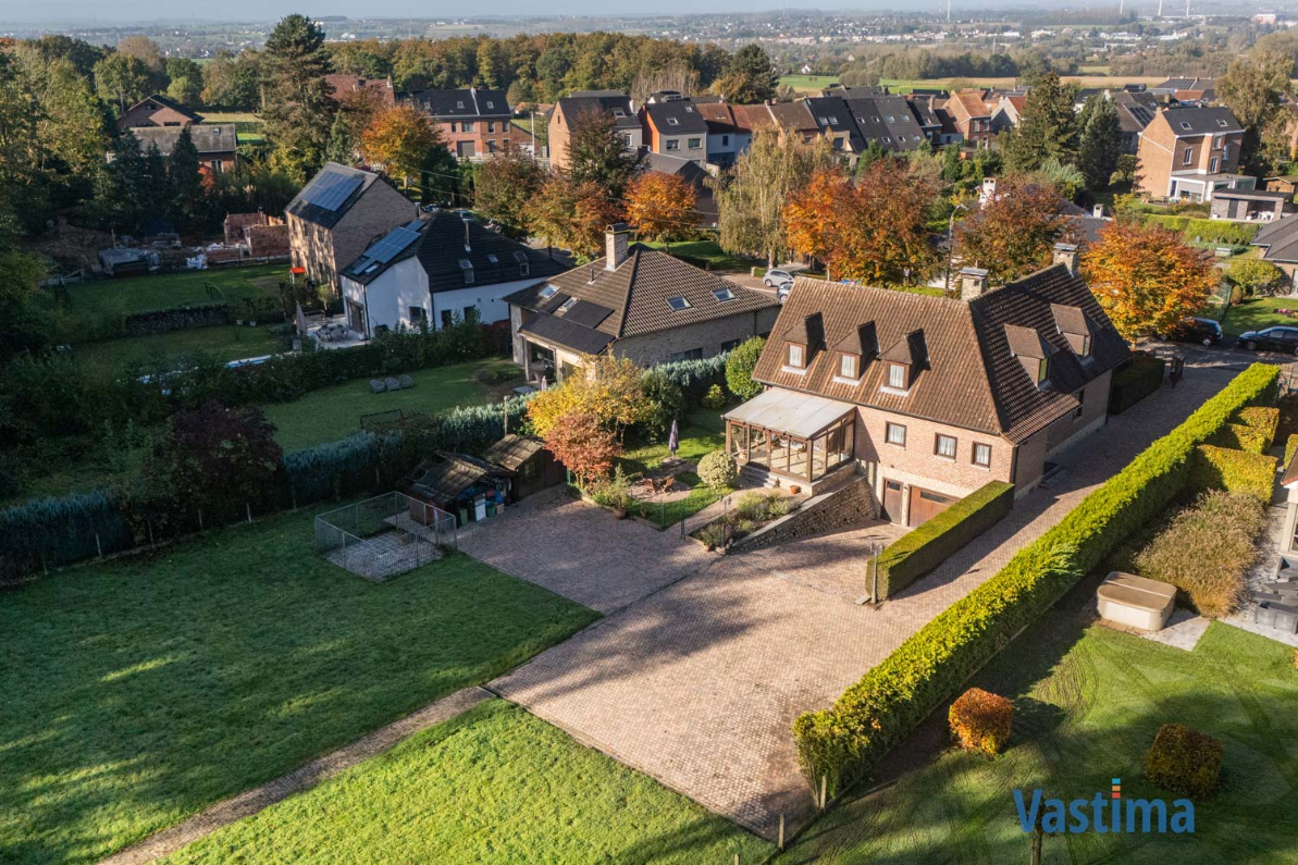 Immo Vastima - Huis Te koop Halle - Statige villa met enorm potentieel in een prachtige groene omgeving