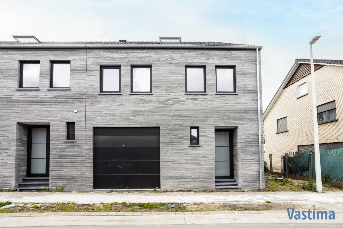 Immo Vastima - Huis Te koop Denderleeuw - Nieuwbouw halfopen woning met 3 slaapkamers, garage en tuin