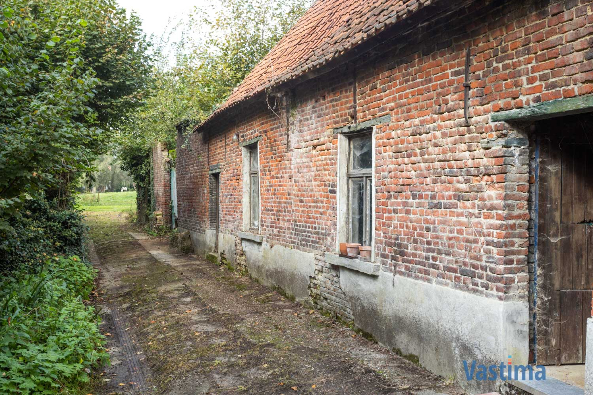 Immo Vastima - Huis Te koop Opwijk - Charmant hoevetje met schuur in een groene oase