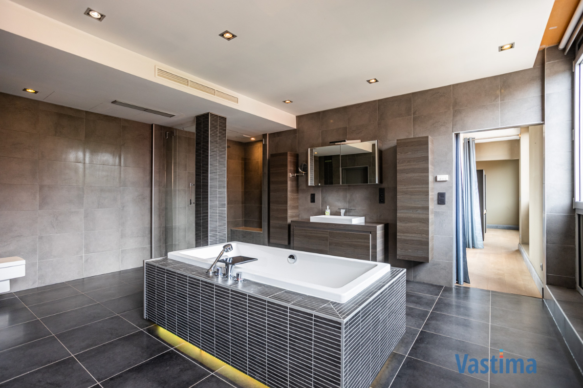 Immo Vastima - Appartement Te koop Moorsel - State of the art loft met groot terras, garage en polyvalente ruimtes – Een woonbeleving uniek in zijn soort