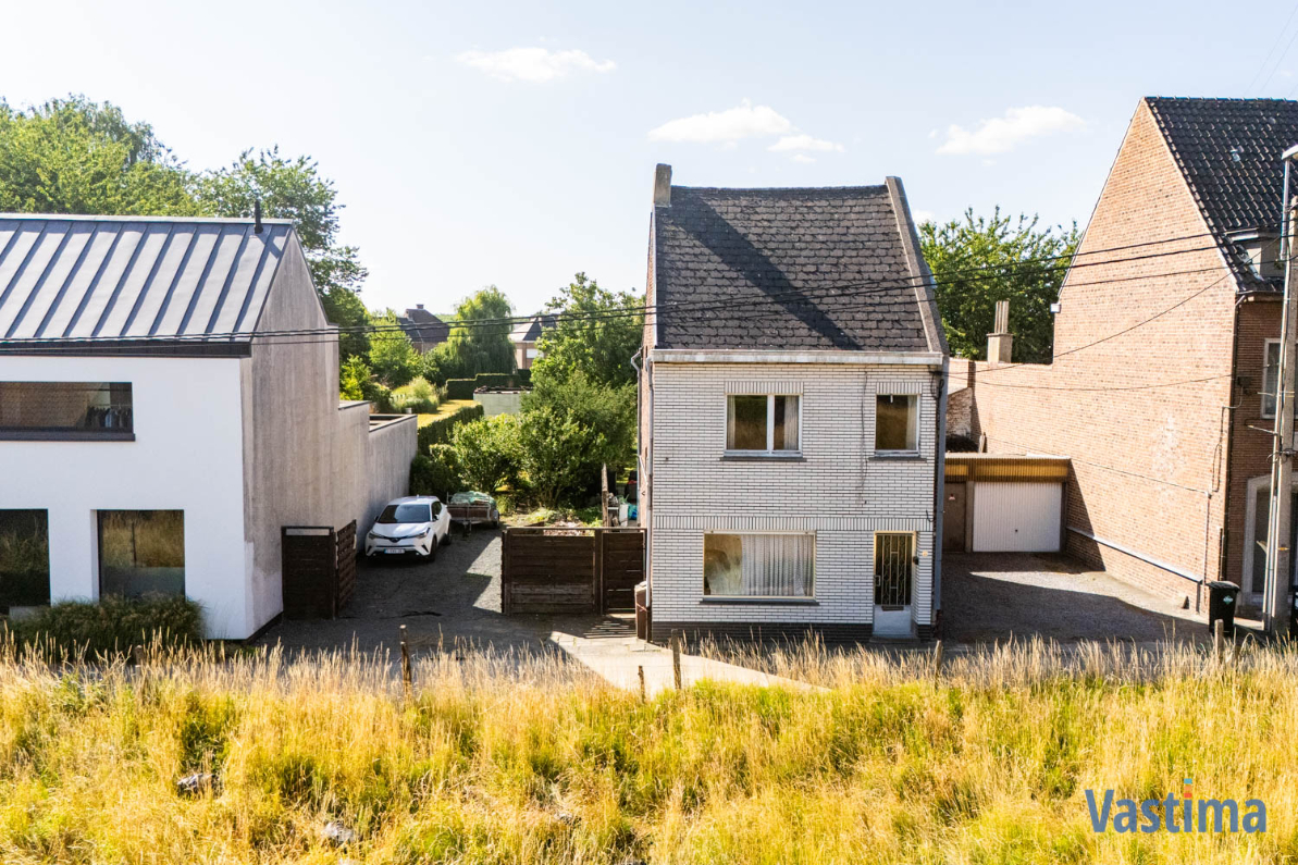 Immo Vastima - Huis Te koop Erembodegem - Renovatiewoning met aanpalende bouwgrond nabij centrum Erembodegem