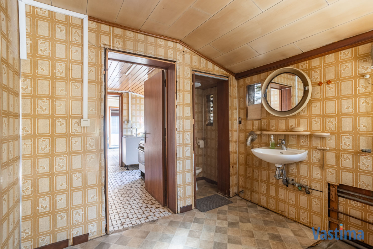 Immo Vastima - Huis Te koop Erembodegem - Renovatiewoning met aanpalende bouwgrond nabij centrum Erembodegem