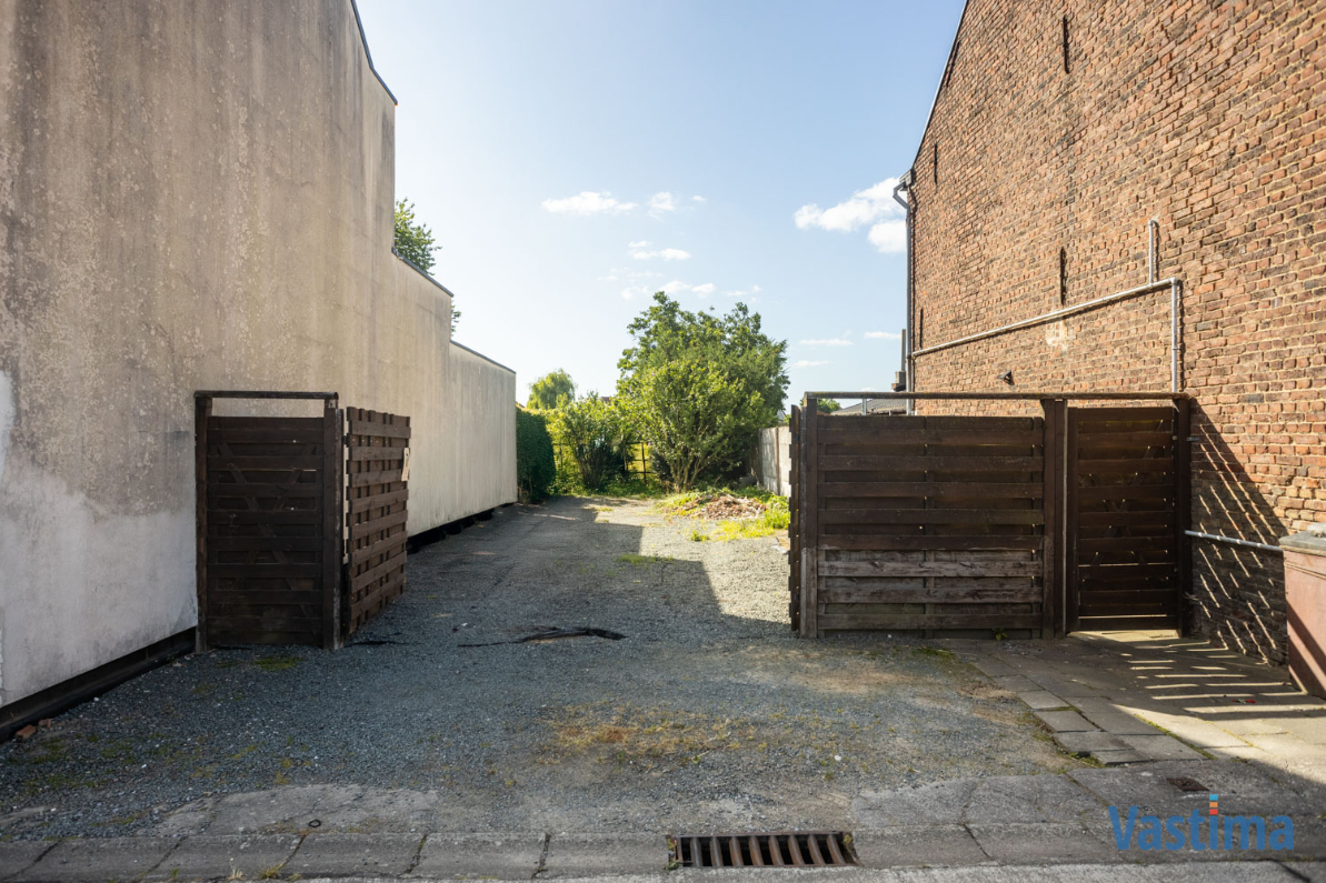 Immo Vastima - Grond Te koop Erembodegem - Bouwgrond nabij centrum Erembodegem met zuidgerichte tuin