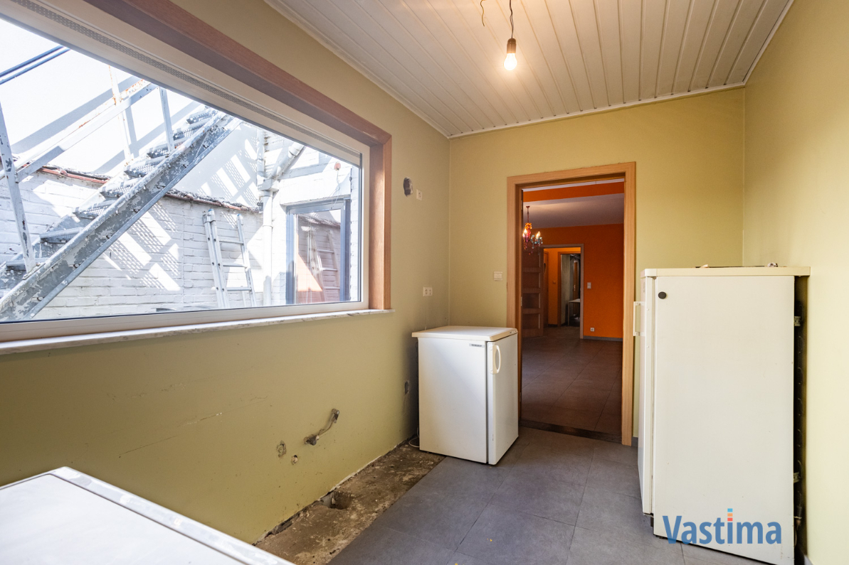 Immo Vastima - Huis Te koop Aalst - Solide rijwoning met garage en tuin in het hart van Aalst