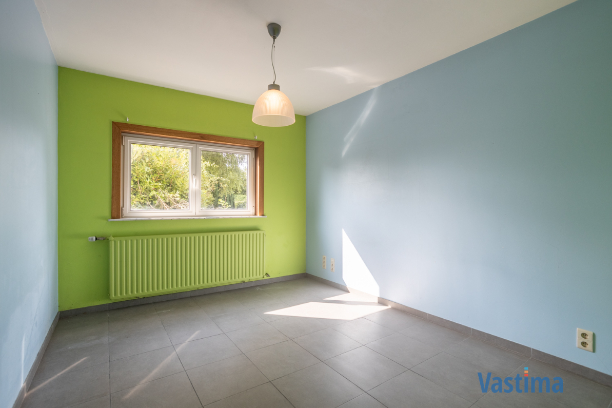 Immo Vastima - Huis Te koop Aalst - Solide rijwoning met garage en tuin in het hart van Aalst