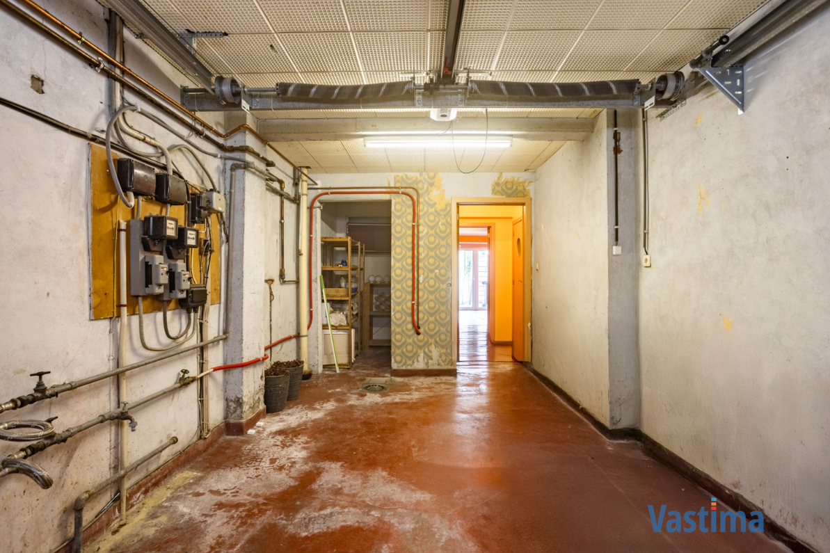 Immo Vastima - Huis Te koop Aalst - Solide rijwoning met garage en tuin in het hart van Aalst
