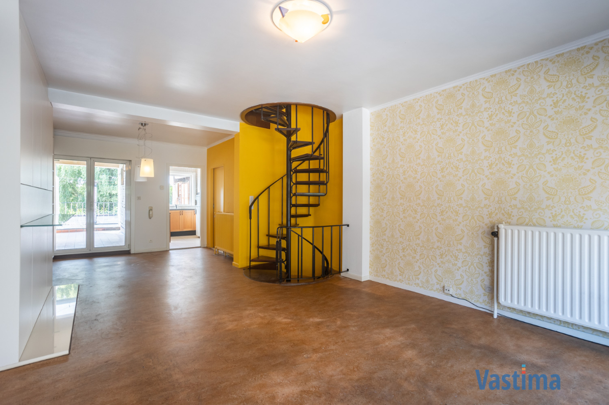 Immo Vastima - Huis Te koop Aalst - Solide rijwoning met garage en tuin in het hart van Aalst