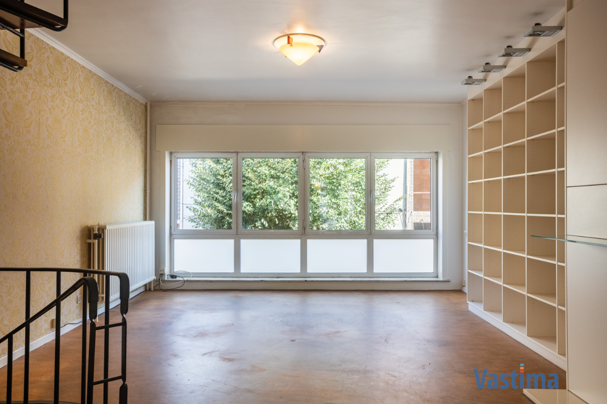 Immo Vastima - Huis Te koop Aalst - Solide rijwoning met garage en tuin in het hart van Aalst