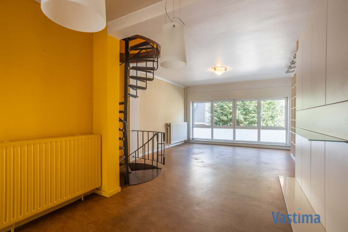 Immo Vastima - Huis Te koop Aalst - Solide rijwoning met garage en tuin in het hart van Aalst