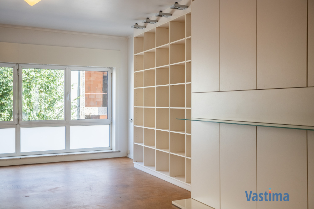 Immo Vastima - Huis Te koop Aalst - Solide rijwoning met garage en tuin in het hart van Aalst