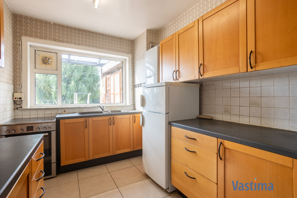 Immo Vastima - Huis Te koop Aalst - Solide rijwoning met garage en tuin in het hart van Aalst