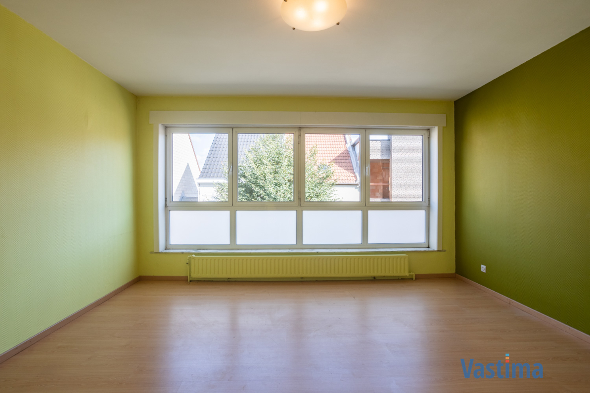 Immo Vastima - Huis Te koop Aalst - Solide rijwoning met garage en tuin in het hart van Aalst