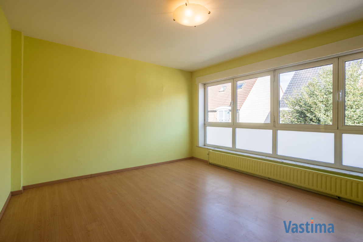 Immo Vastima - Huis Te koop Aalst - Solide rijwoning met garage en tuin in het hart van Aalst