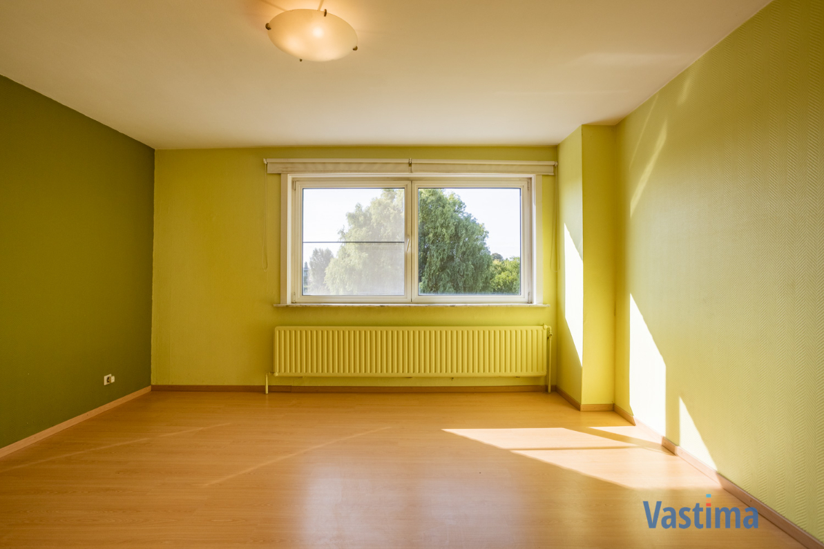 Immo Vastima - Huis Te koop Aalst - Solide rijwoning met garage en tuin in het hart van Aalst