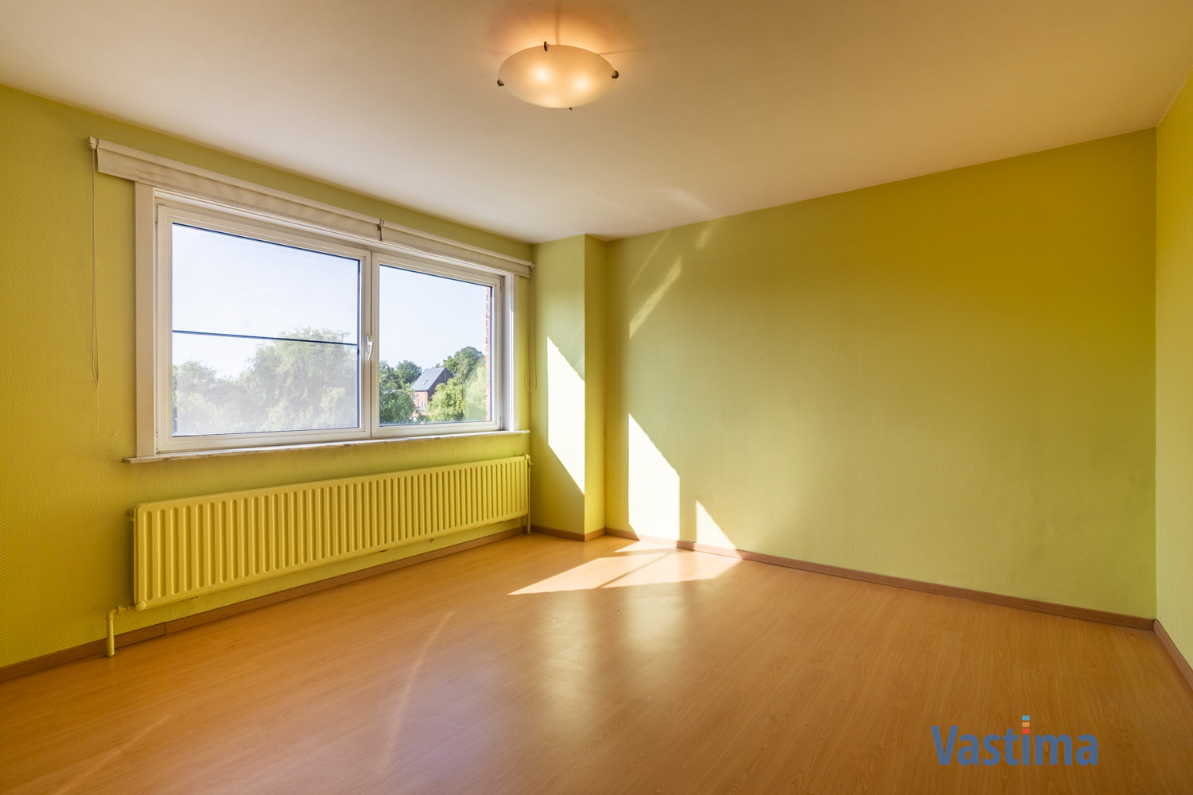 Immo Vastima - Huis Te koop Aalst - Solide rijwoning met garage en tuin in het hart van Aalst