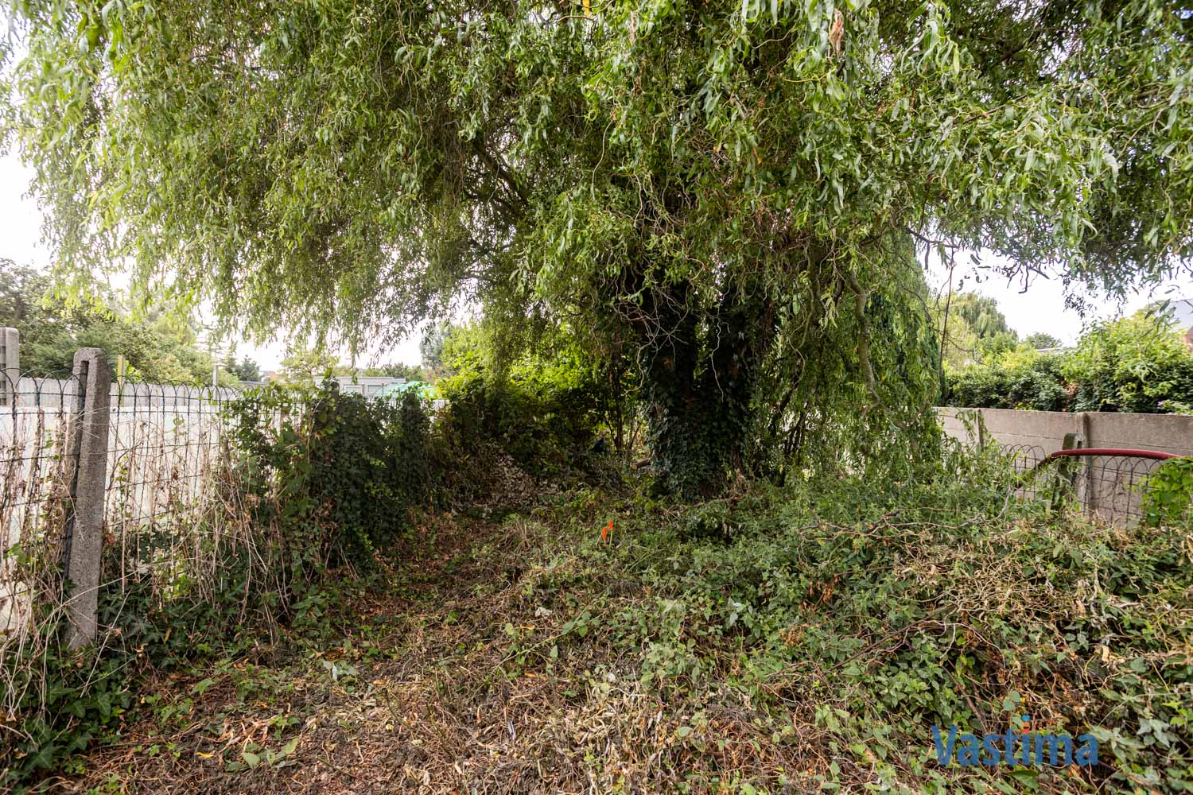 Immo Vastima - Huis Te koop Aalst - Solide rijwoning met garage en tuin in het hart van Aalst