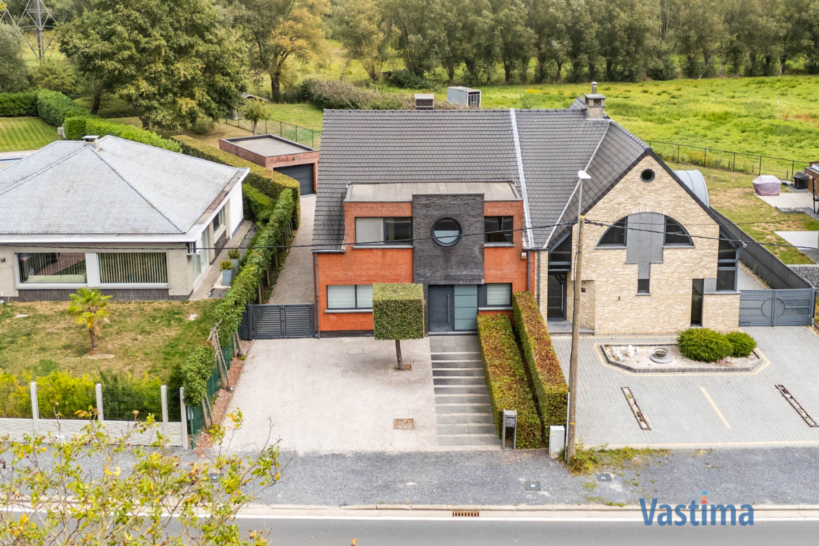 Immo Vastima - Huis Te koop Pamel - Ruime instapklare gezinswoning met zonnige tuin en garage