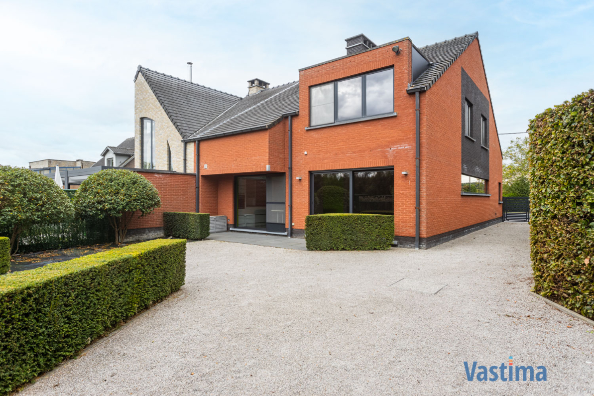 Immo Vastima - Huis Te koop Pamel - Ruime instapklare gezinswoning met zonnige tuin en garage