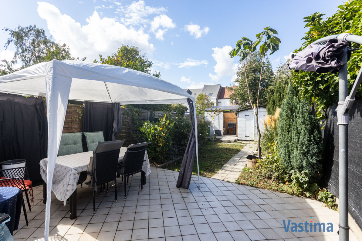 Immo Vastima - Huis Te koop Aalst - Licht op te frissen gezins- of starterswoning met tuin in Aalst