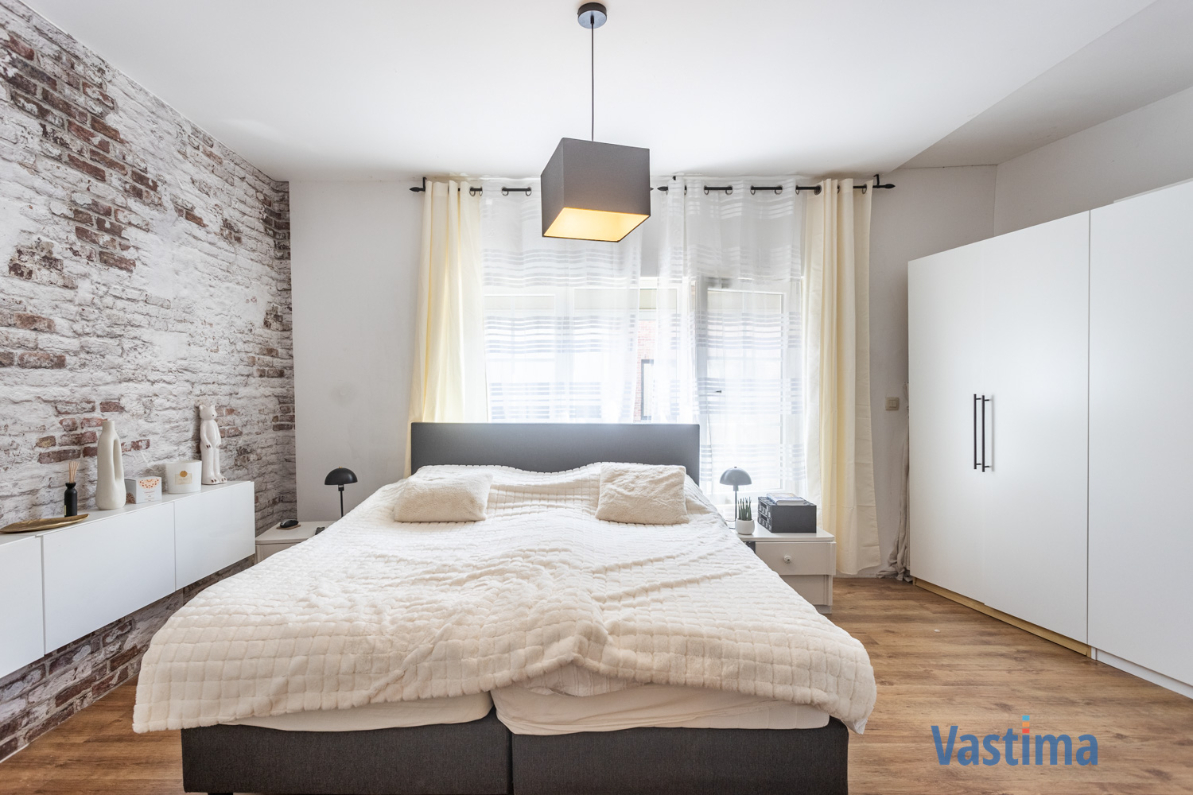 Immo Vastima - Huis Te koop Aalst - Licht op te frissen gezins- of starterswoning met tuin in Aalst
