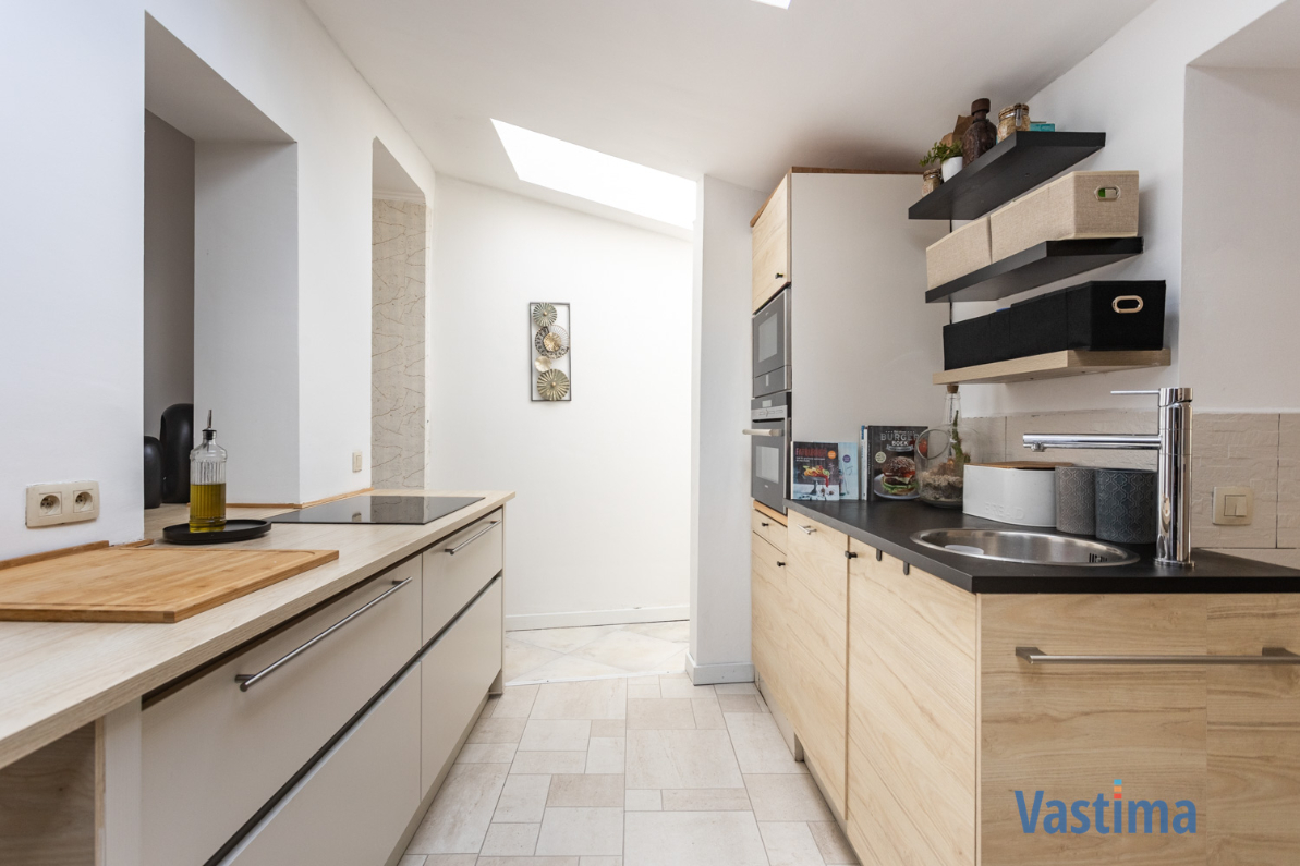 Immo Vastima - Huis Te koop Aalst - Licht op te frissen gezins- of starterswoning met tuin in Aalst