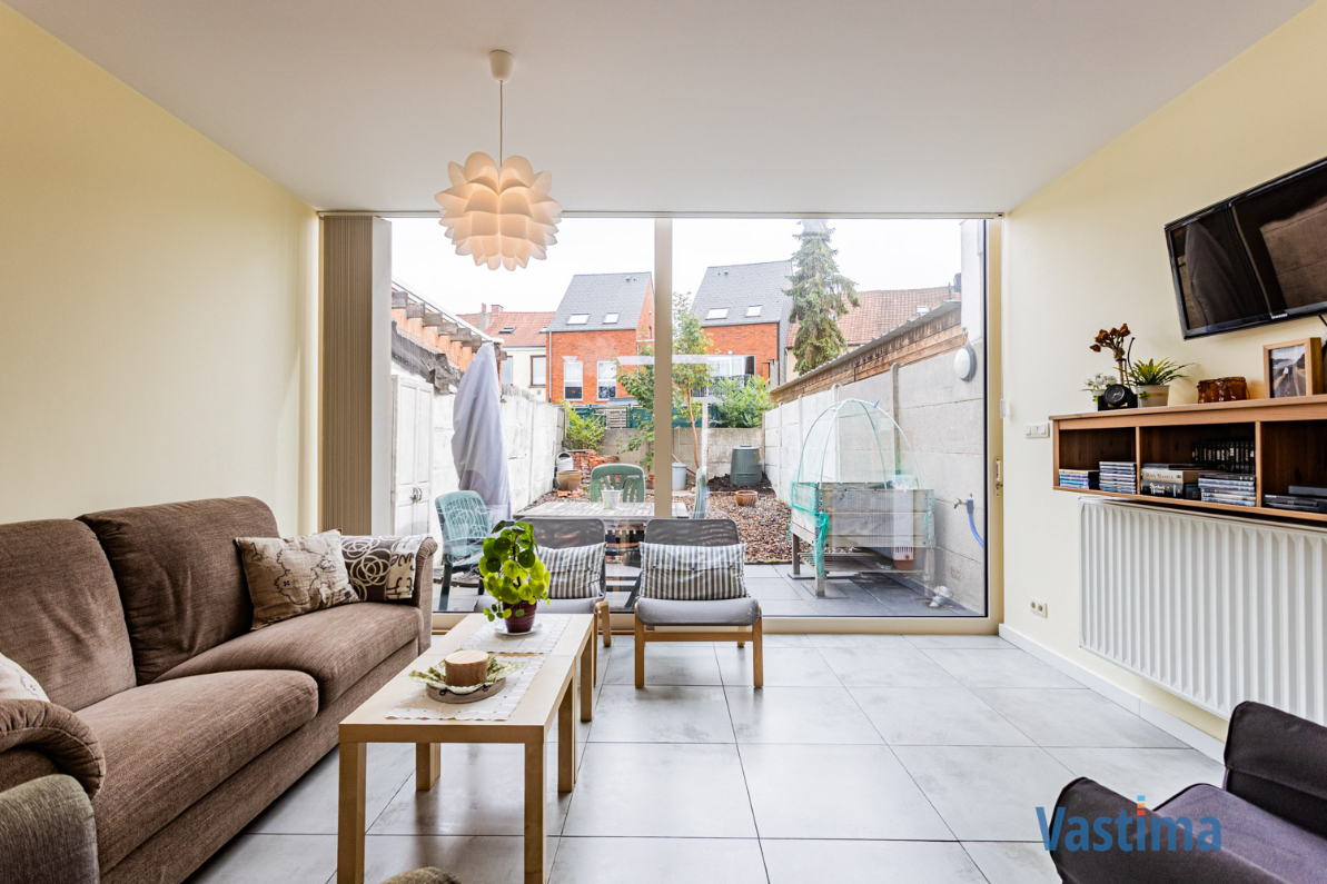 Immo Vastima - Huis Te koop Aalst - Instapklare stadswoning met tuin: ruimte, licht en comfort in één