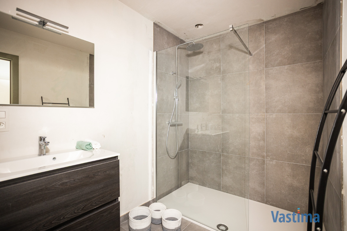 Immo Vastima - Huis Te koop Denderleeuw - Nieuwbouw gesloten woning met 3 slaapkamers, garage en tuin