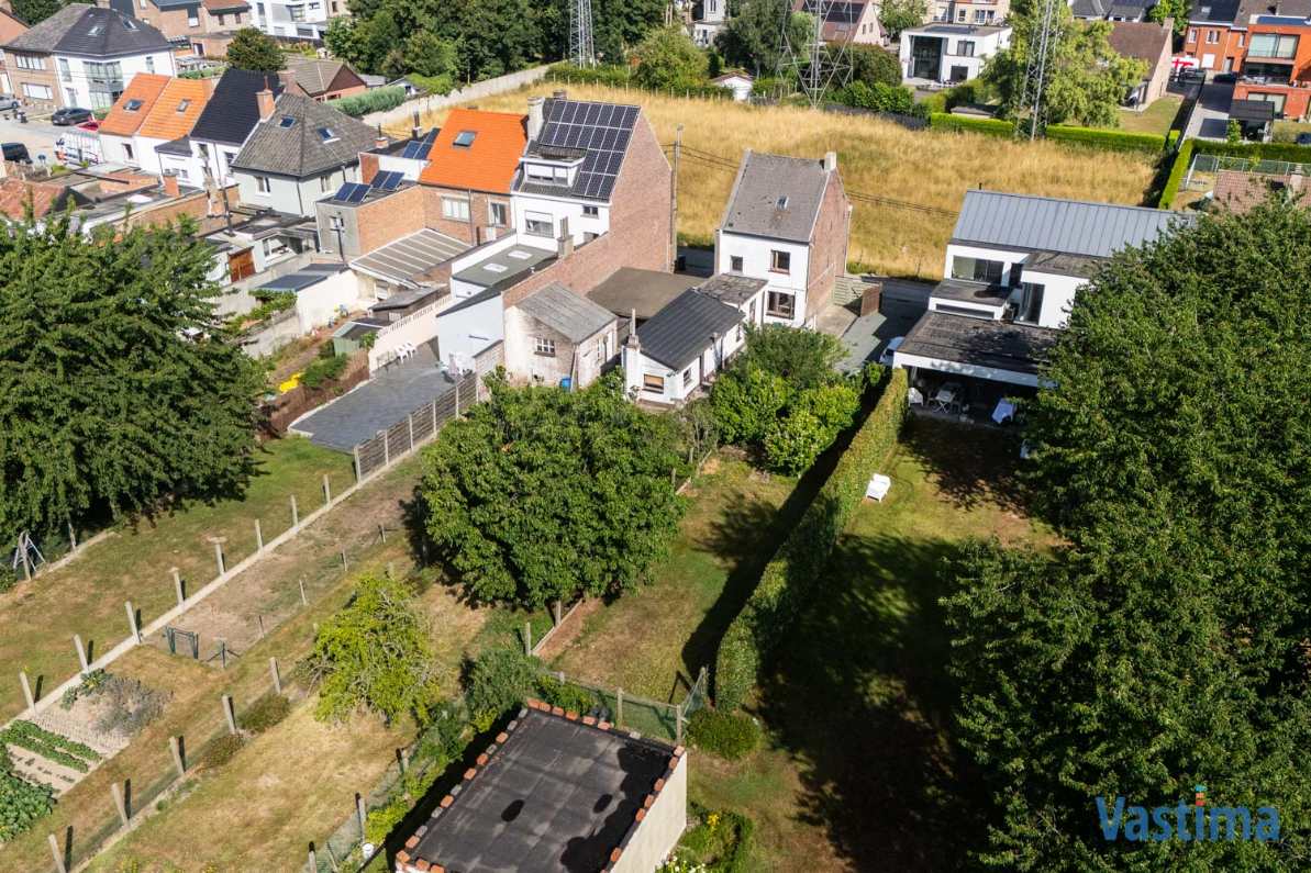 Immo Vastima - Grond Te koop Erembodegem - Bouwgrond nabij centrum Erembodegem met zuidgerichte tuin