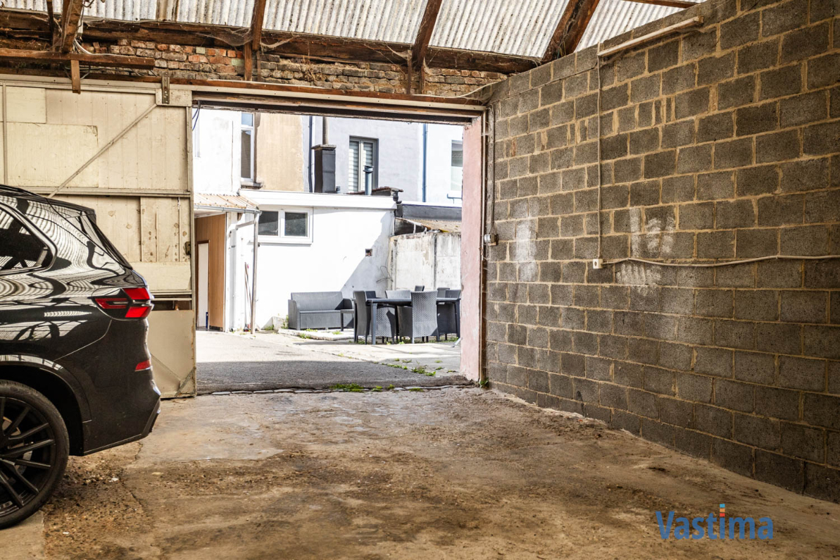 Immo Vastima - Huis Te koop Aalst - Twee aanpalende woningen met loods nabij centrum Aalst – ideaal voor wonen, werken of project