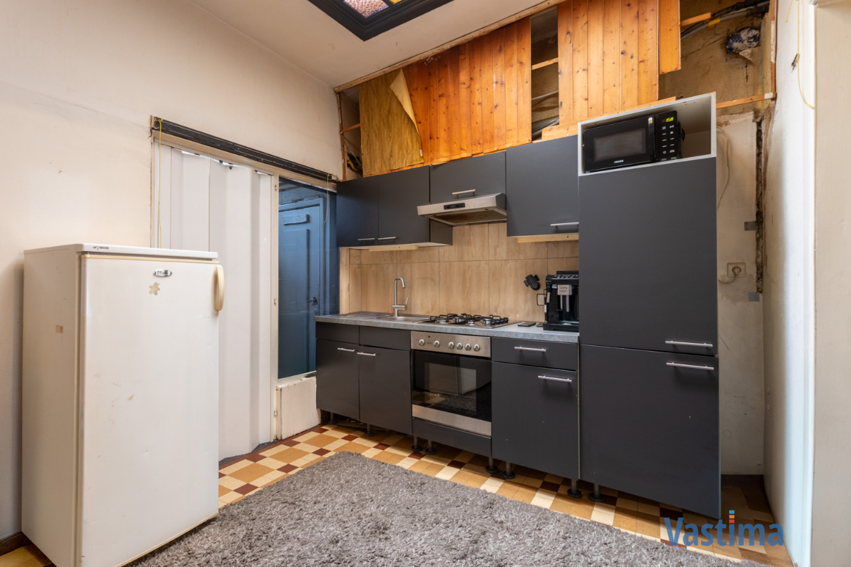 Immo Vastima - Huis Te koop Aalst - Twee aanpalende woningen met loods nabij centrum Aalst – ideaal voor wonen, werken of project