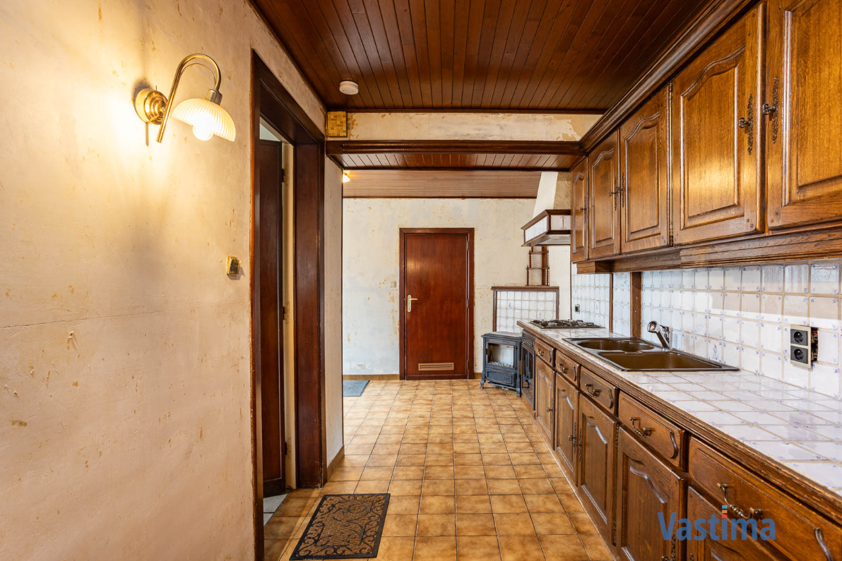 Immo Vastima - Huis Te koop Lede - Te renoveren, halfopen woning met zuid gerichte tuin