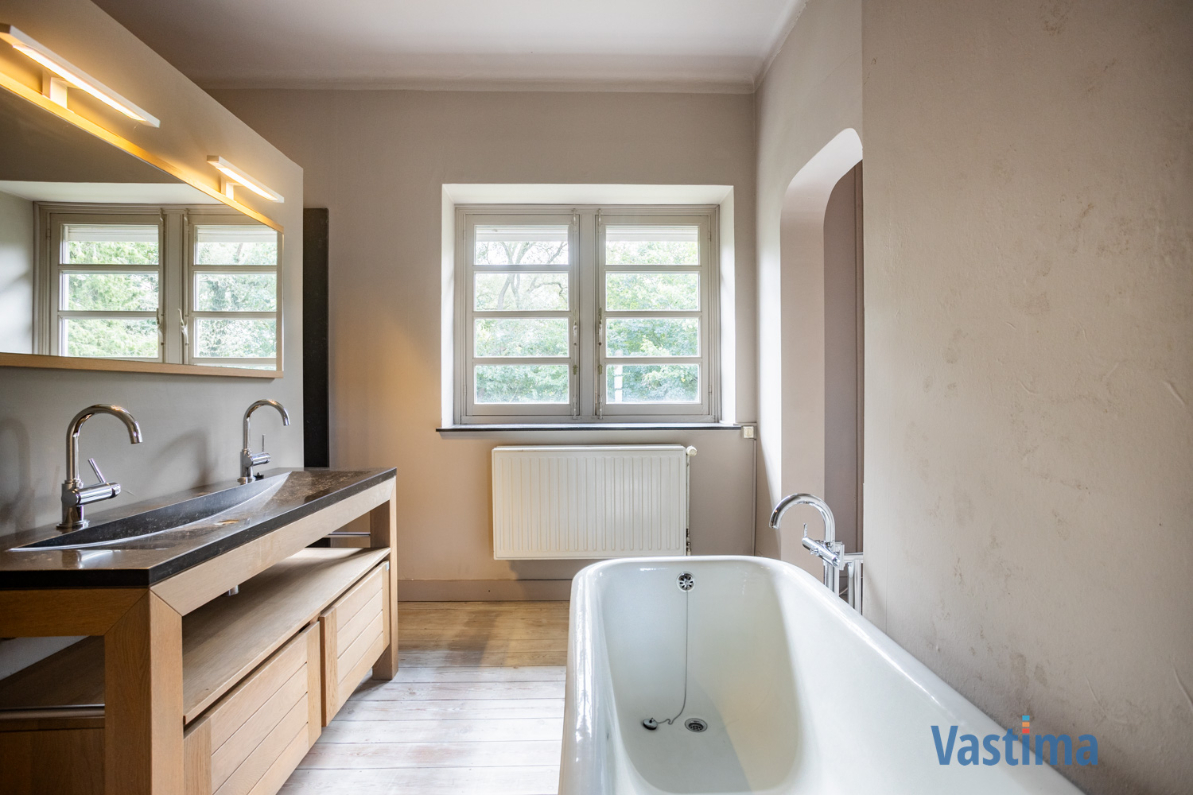 Immo Vastima - Huis Te koop Meldert - Karaktervolle villa met authentieke charme in een groene setting