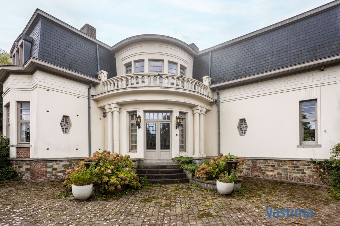 Immo Vastima - Huis Te koop Meldert - Karaktervolle villa met authentieke charme in een groene setting