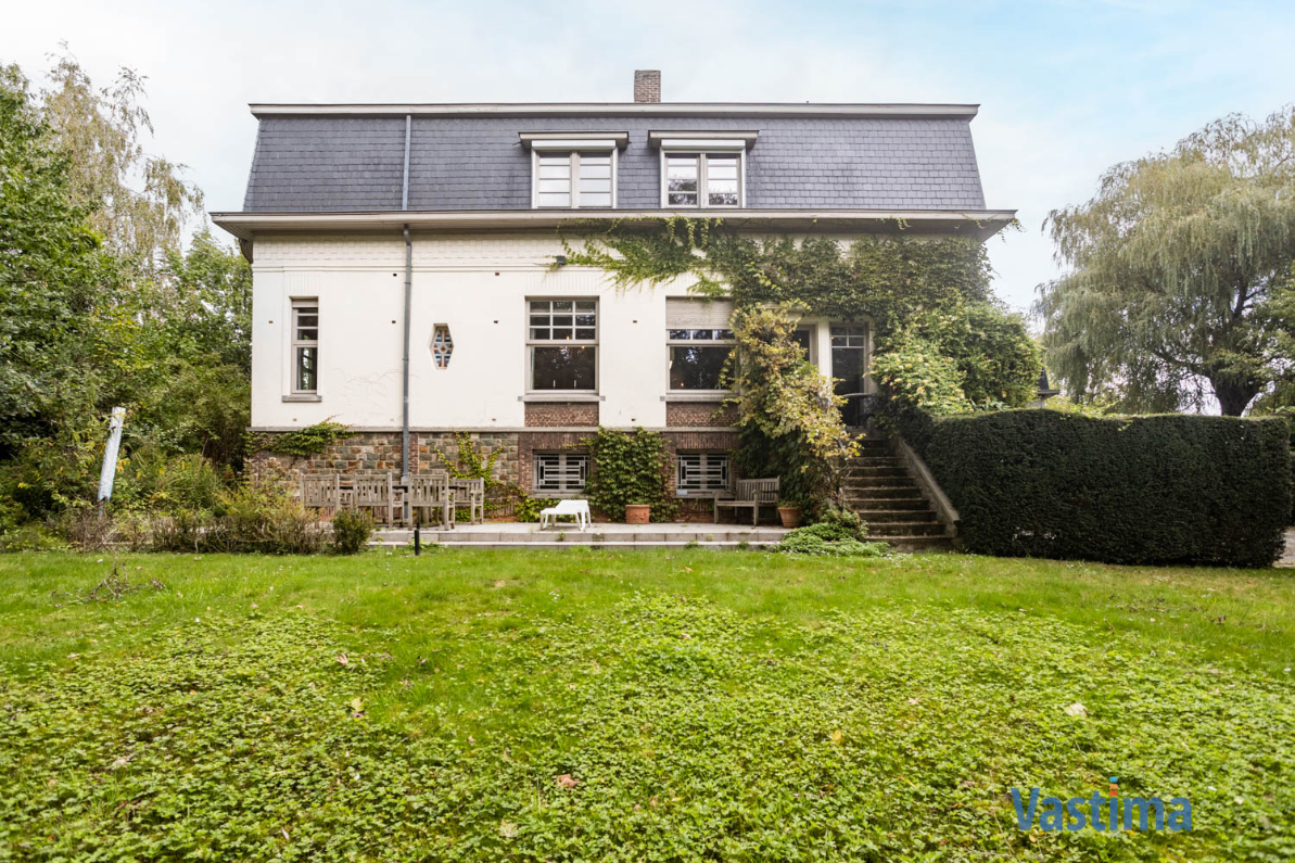 Immo Vastima - Huis Te koop Meldert - Karaktervolle villa met authentieke charme in een groene setting