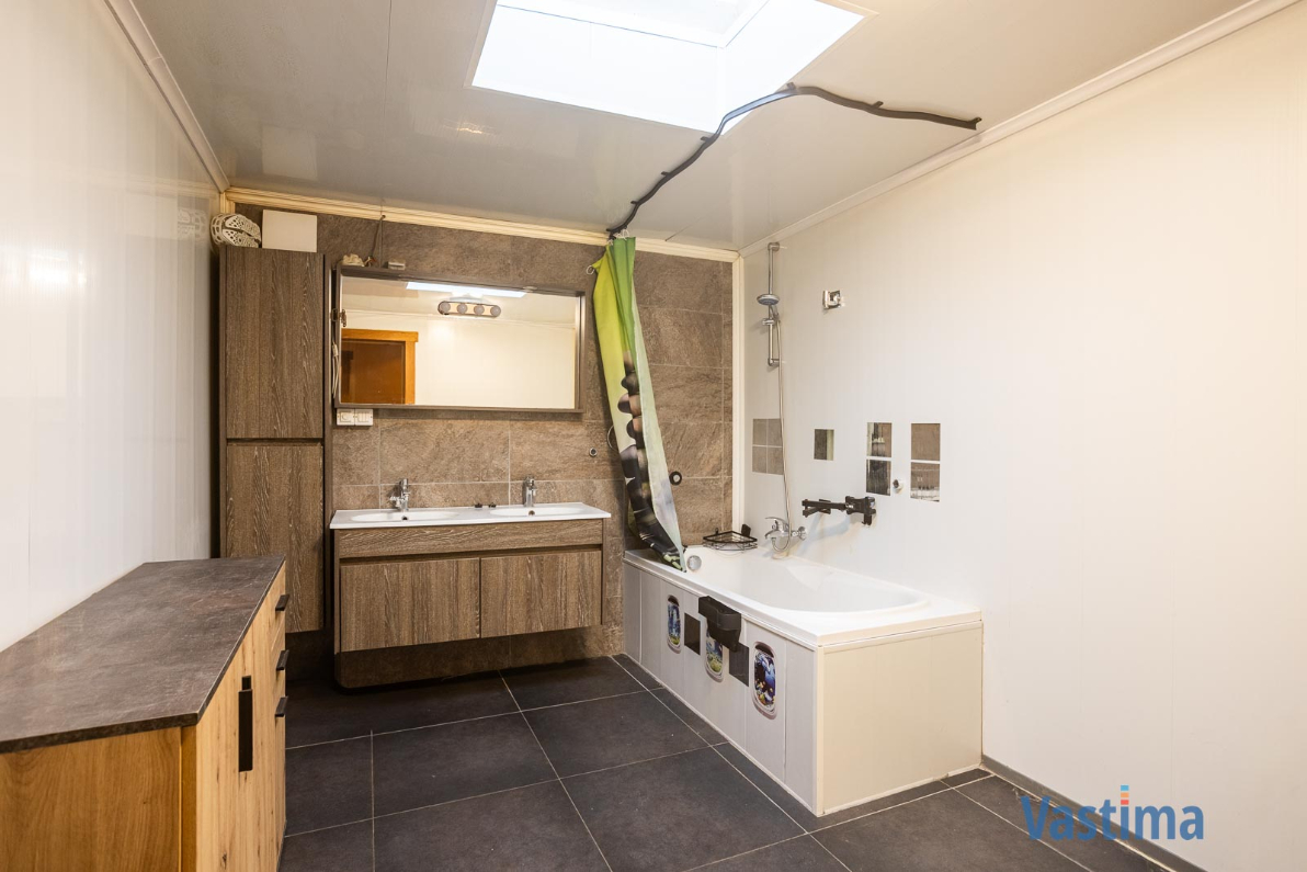 Immo Vastima - Huis Te koop Aalst - Stadswoning met zonnepanelen en tuin