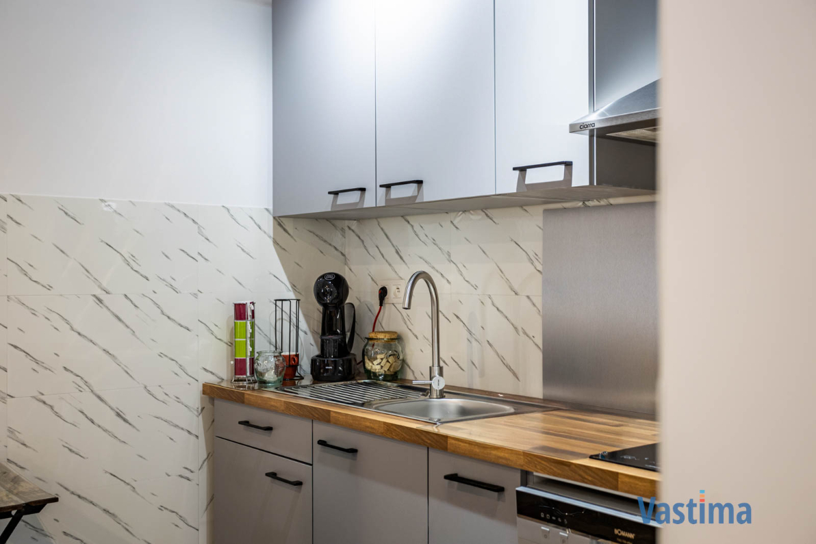 Immo Vastima - Commercieel Te koop Erembodegem - Handelswoning met garage en buitenruimte