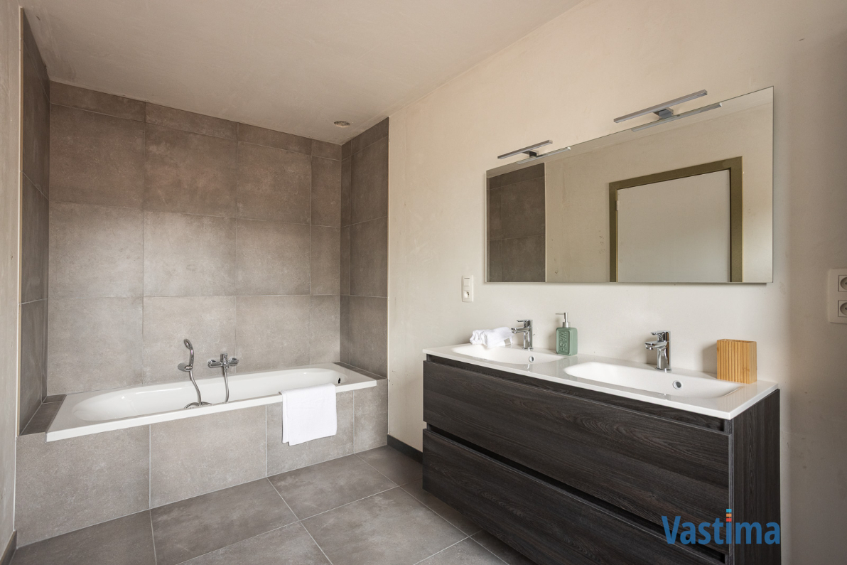 Immo Vastima - Huis Te koop Denderleeuw - Nieuwbouw gesloten woning met 3 slaapkamers, garage en tuin