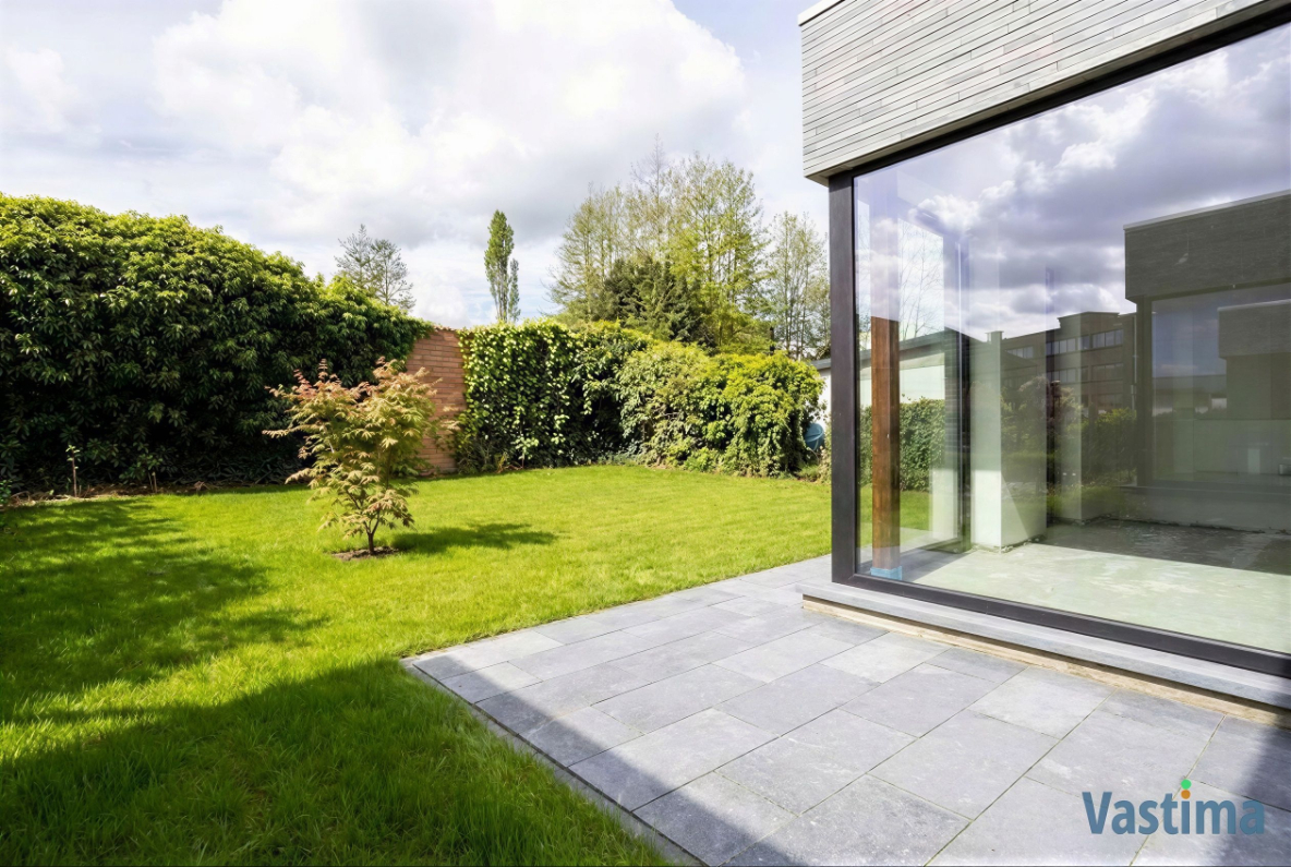 Immo Vastima - Huis Te koop Denderleeuw - Nieuwbouw halfopen woning met 3 slaapkamers, garage en tuin