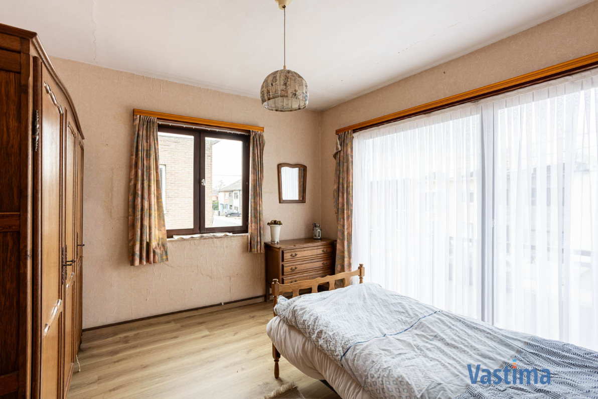 Immo Vastima - Huis Te koop Lede - Halfopen woning in Lede met 3 slaapkamers, garage en buitenruimte