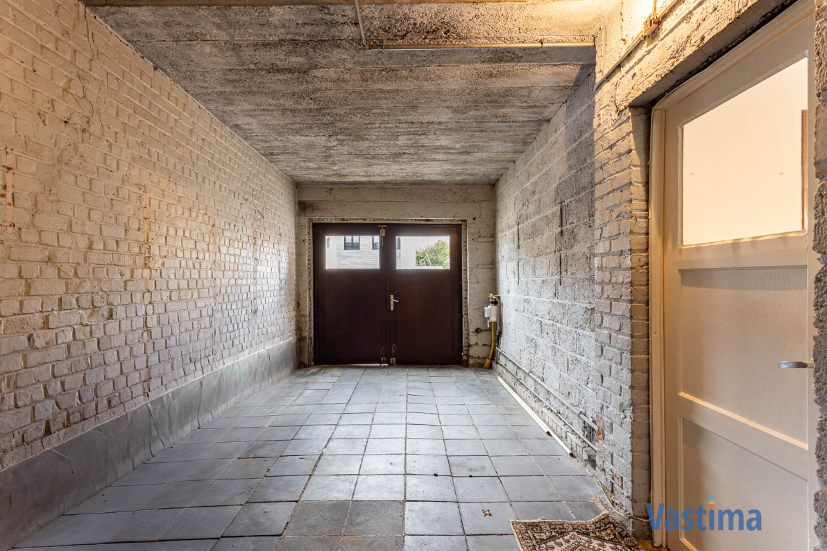 Immo Vastima - Huis Te koop Lede - Halfopen woning in Lede met 3 slaapkamers, garage en buitenruimte